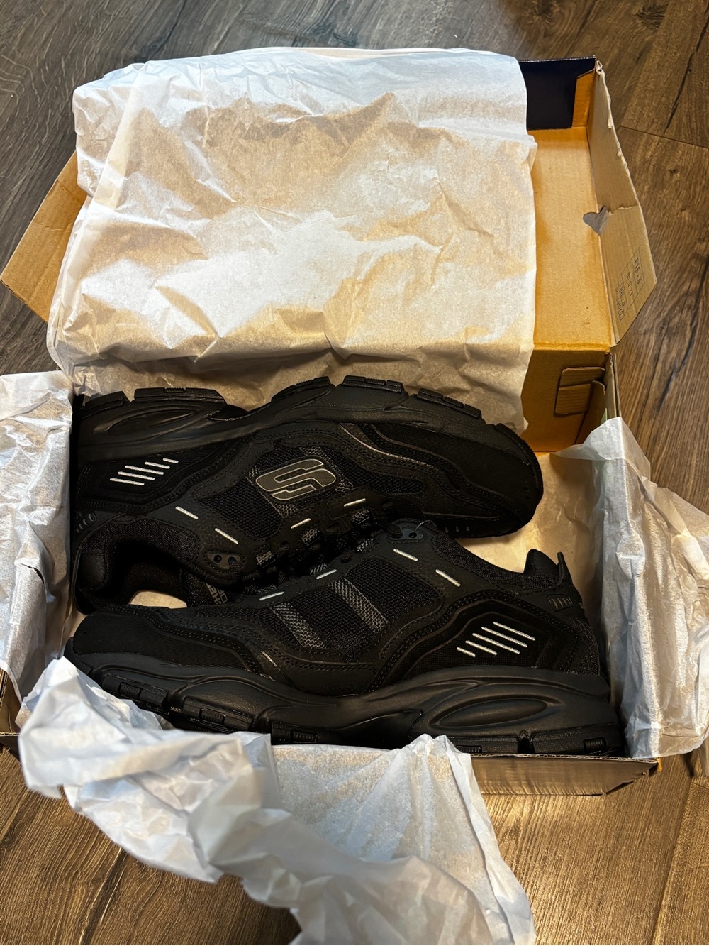Skechers Men's All-Black Athletic Trainer with Reflective Accents